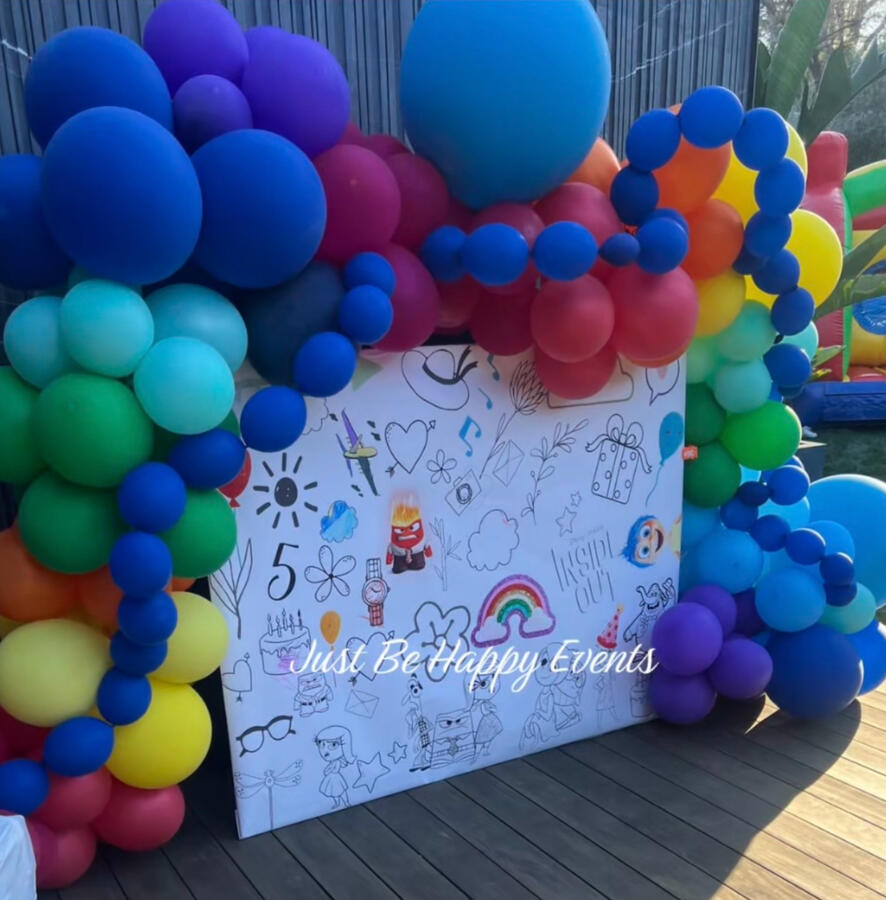 Colorful kids birthday party setup with custom decor by Just Be Happy Events